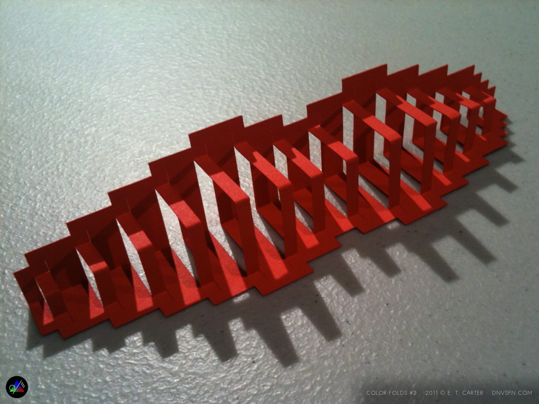 Long red accordion.