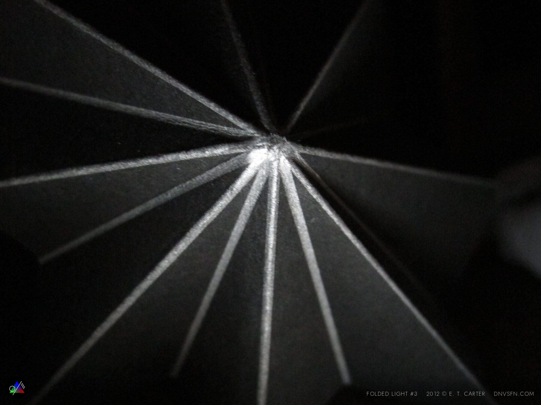Radial pleat, raking light.