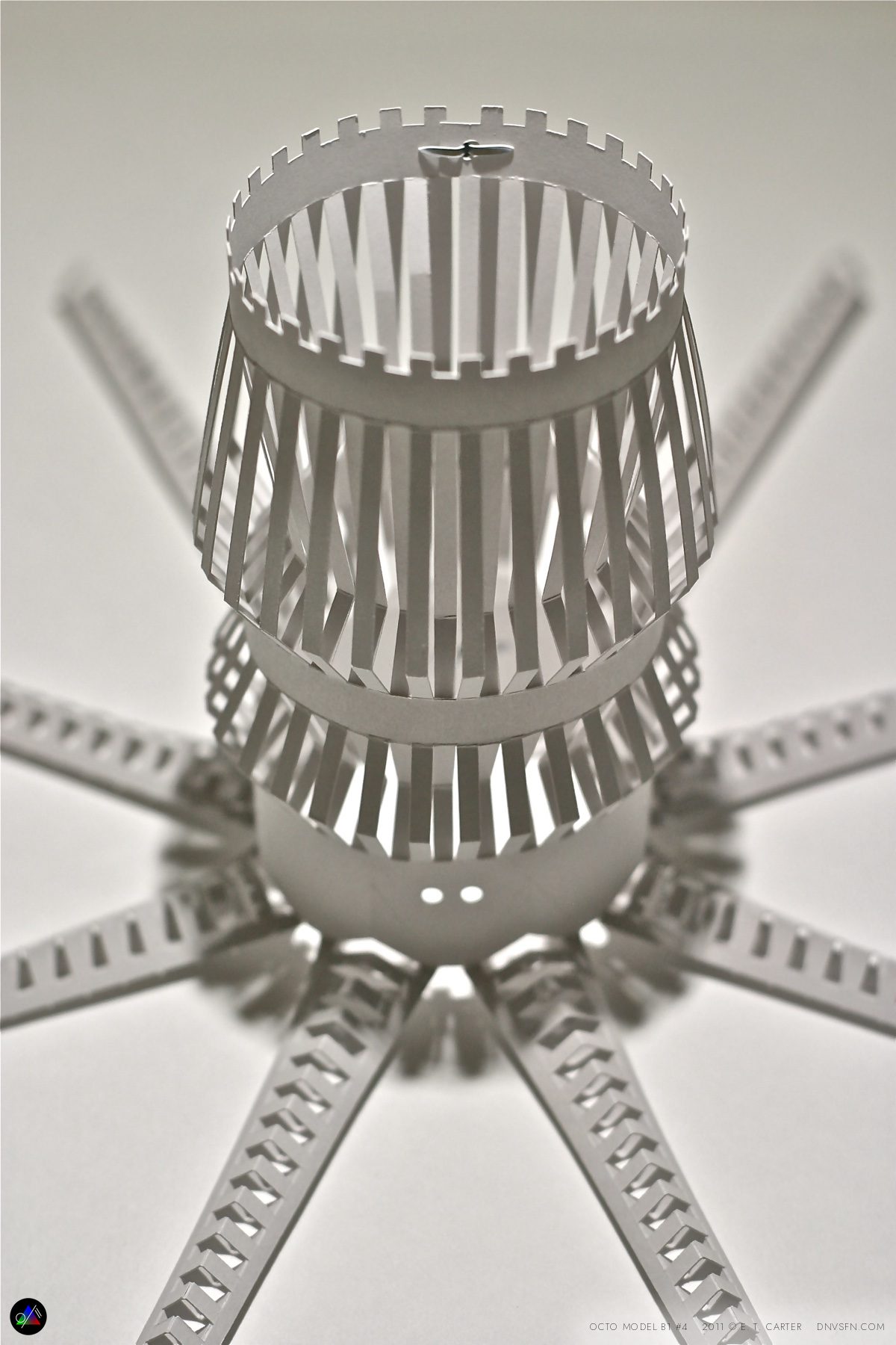 The conical body upright.