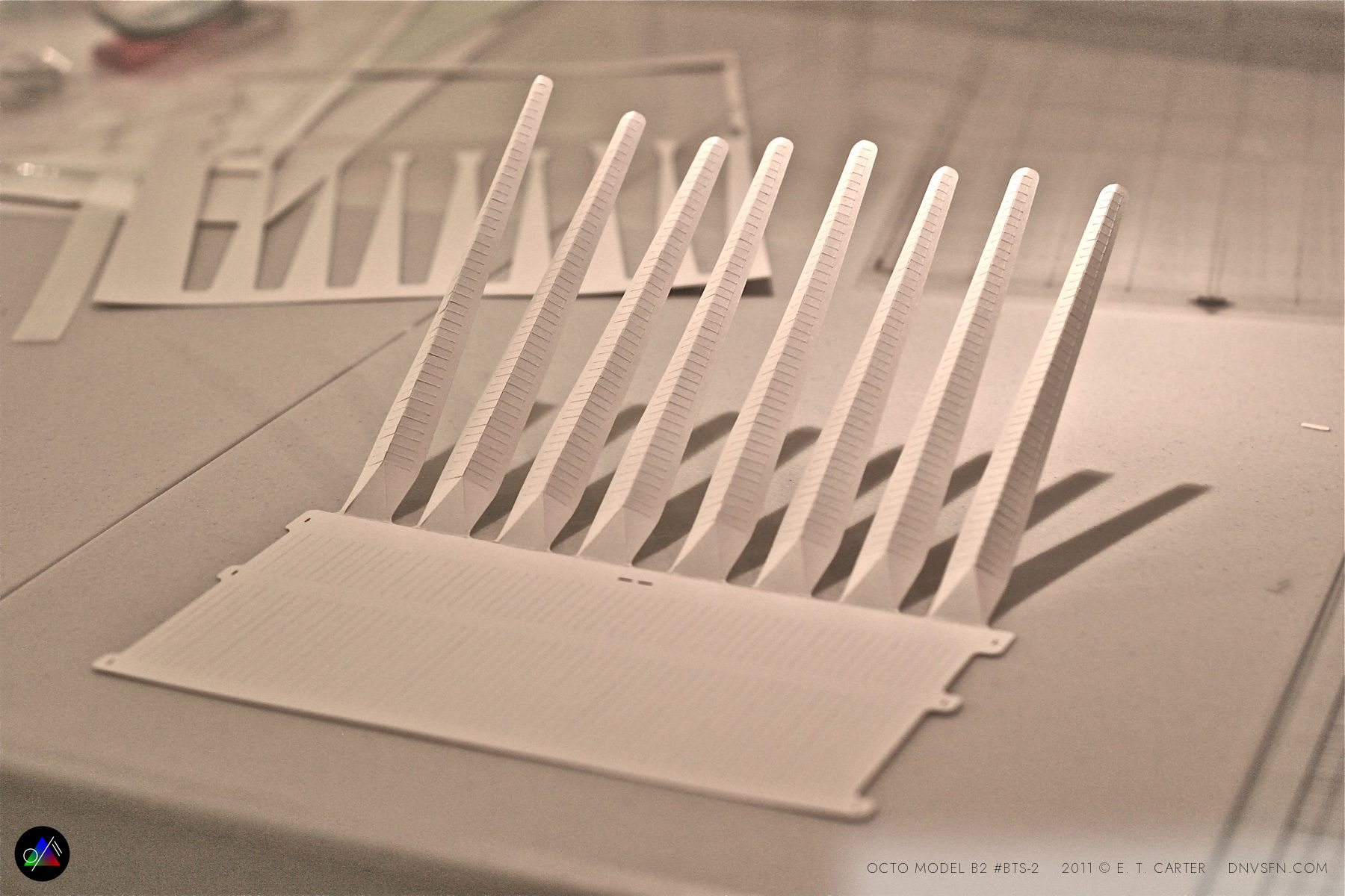 Peeling the plotter-cut legs from the backing