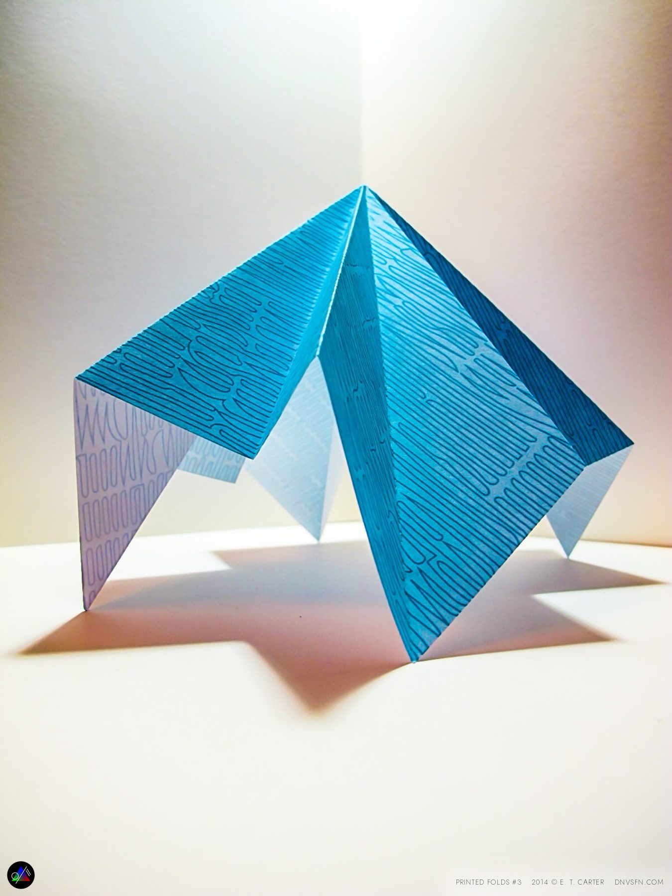 Linework on blue, peaked.
