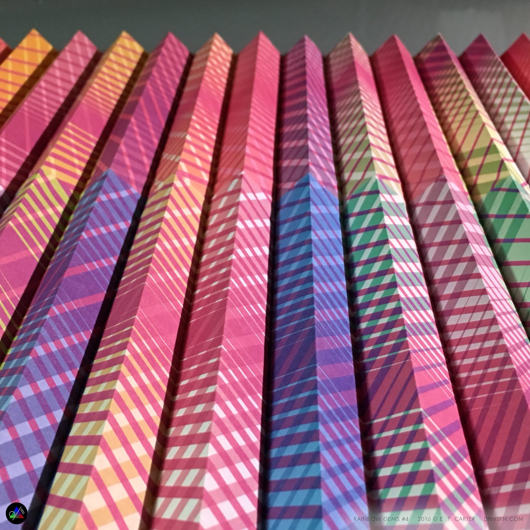 Rainbow-pleated backdrop.