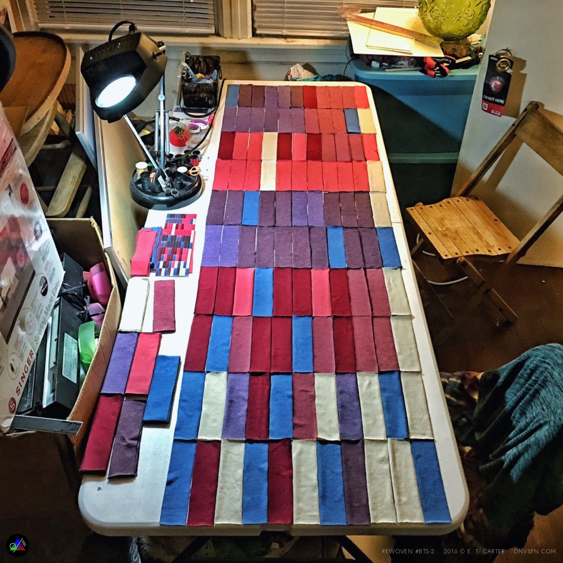Color-block panels laid out across the studio table