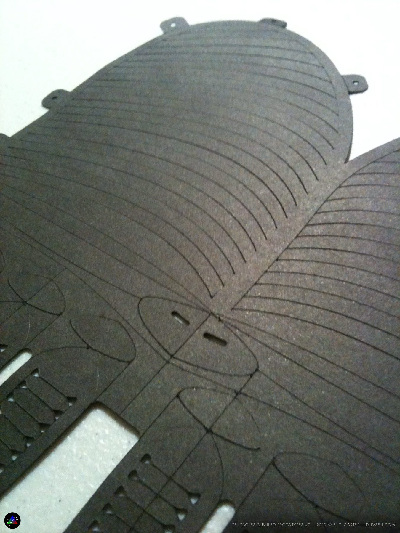 Scored body panel on the cutting bed.