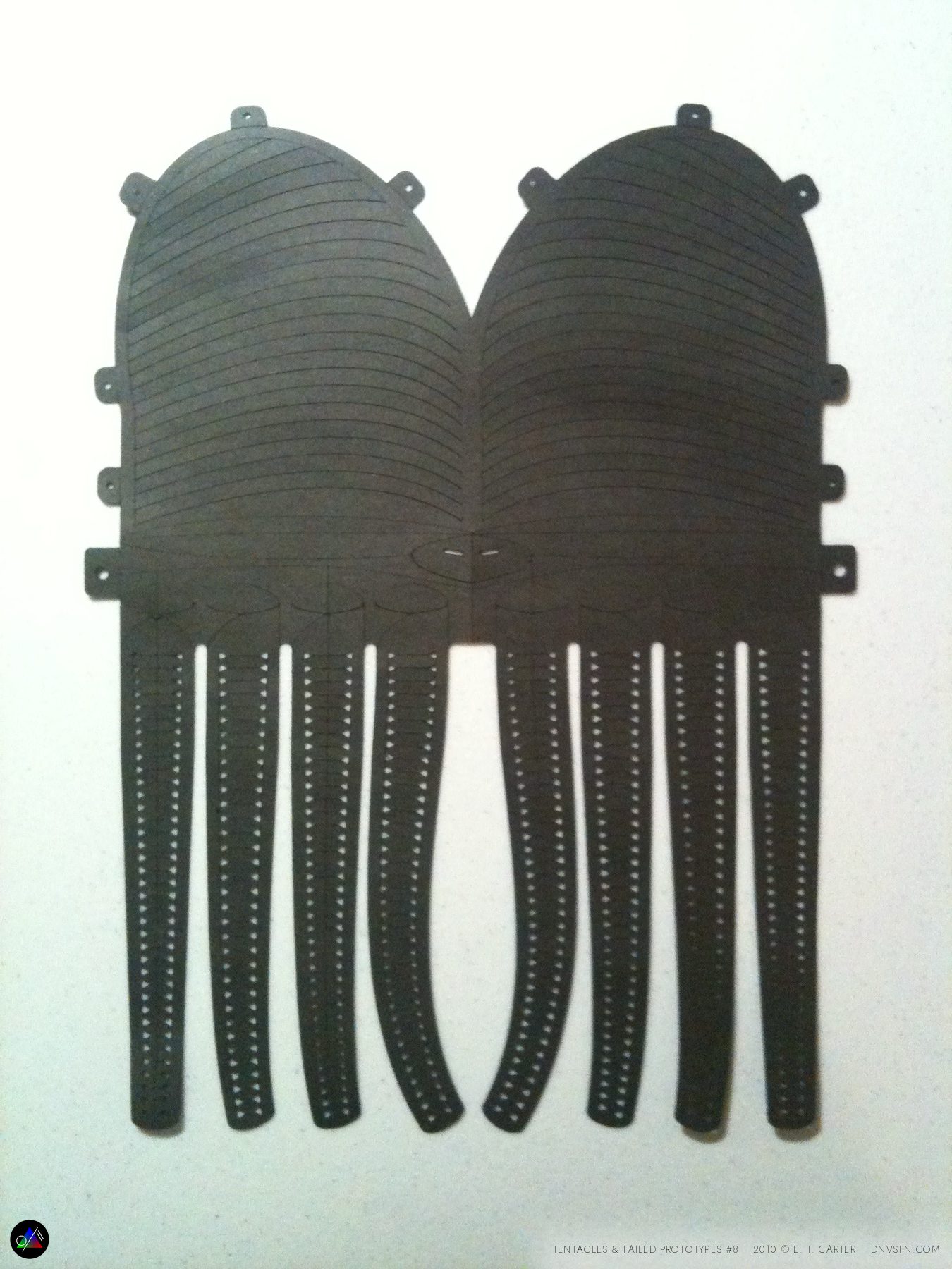 A two-headed prototype, tentacles hanging.